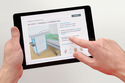 An e-learning module being used on an iPad.